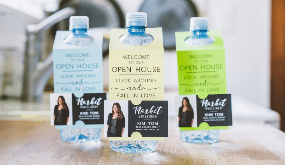 Branded bottle hang tags for open house.
